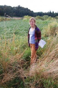 Ingrid Evjen-Elias, SPROut assistant, enjoys the wetlands along the highway near the entrance to The Oregon Garden.