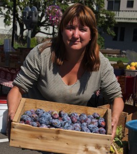 Melody Harpole of Harpole\'s Produce, shown at Silverton Farmer\'s Market, regularly donates produce to SACA for the food bank.