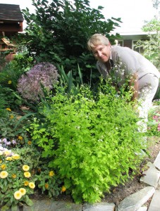 Polly Youngren, assistant director of nurses at Providence Benedictine Nursing Center, enjoys the therapy garden.