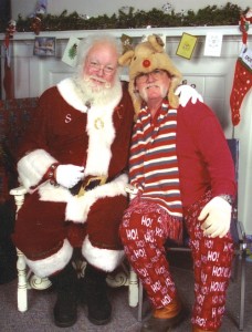 Santa Claus visits with his good friend, Dennis Downey, who helps out every year at Celebration of Families in Silverton. Downey loves donning his “goofball” attire and seeing Christmas as children see it.