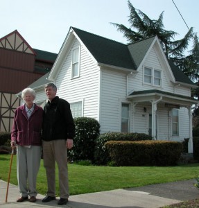 Henrietta Saalfeld stands with Mount Angel Mayor Rick Schiedler by the property she donated to the city for use as a park. Saalfeld lived in the house since she was a small child. In March she handed over the keys to the house, one of the oldest in Mount Angel. The property is to be known as Saalfeld Family Park. 