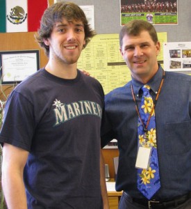 Joe Cartwright, now working with Teach for America in Wisconsin, visits with JFK principal Troy Stoops.