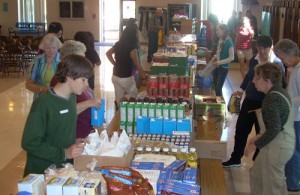 Volunteers organize the food before clients arrive. 
