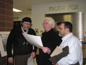 Gus Frederick, Jossi Davidson and Chuck Sheketoff look at streetscape plans