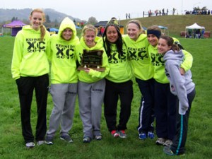 The Kennedy Booster Club provides support to all teams, including the 2011 girls’ cross country team that took third in state.