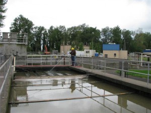 A Silverton city employee works at the wastewater plant.