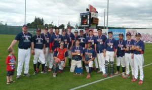 Kennedy High\'s baseball team with 2A Baseball trophy.
