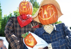 A family of scarecrows haunt the grounds of The Oregon Garden.
