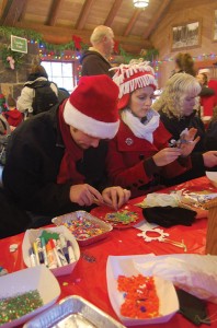 All ages take to the craft tables to make ornaments, cards and other seasonal goodies. 
