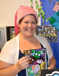Kristin Aalbue with her children’s books at the Silverton Santa Mouse Bazaar on Dec. 1.