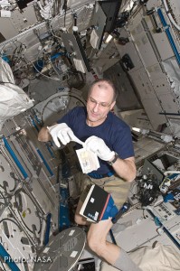 Don Pettit at work and afloat on the International Space Station. Photo: NASA
