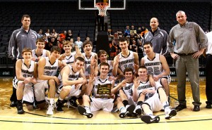 The Silverton High School boys basketball team and coaches after winning the third-place game March 9 at the OSAA Class 5A state tournament at Matthew Knight Arena in Eugene. Photograph by Ted Miller Jr. 