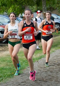 Former Silverton High School athlete Morgan Anderson (430) runs in Bush’s Pasture Park in Salem during last fall’s Charles Bowles Invitational cross country meet.  Photo by  Stoddard Reynolds 