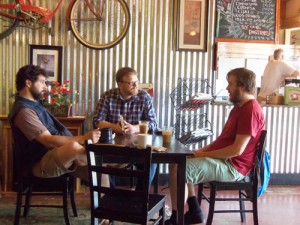 John Pattison meets with friends at Gear Up Espresso in Silverton – where he wrote portions of the book.