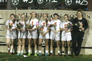 Silverton seniors, from left, Shelly Kinney, Baylie Cameron, Hailey Satyna, Heidi Moore, Hannah Doyle, Lizzy Roth and Tessa Oster were honored at Senior Night against Dallas. Photo by Tanner Russ