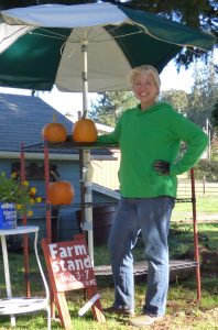 kris-mitchell-at-the-farm-stand-portion-of-eastview-garden-share-2