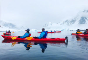 Kayaking off Danco Island. Right: Ice and snow at Neko Harbor. Photo by Steve Ritchie.