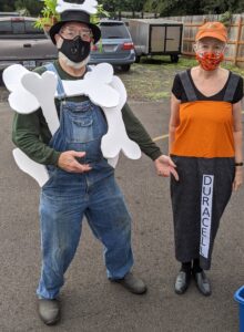 Sustainable-Silverton-members-Mike-Ashland-and-Karen-Garst-dressed-up-for-the-batteries-and-bones-recycling-and-composting-initiative