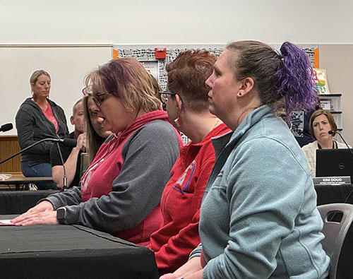 Members of the Executive Team of the Silver Falls Education Association share concerns aboutalleged financial mismanagement March 11 during the Silver Falls School District board meeting. Stephen Floyd