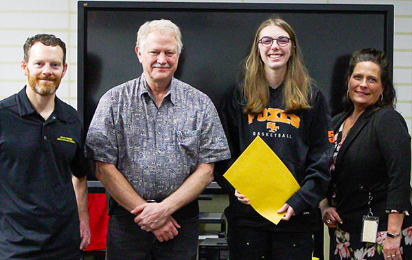 Baldwin receiving recognition from the Asphalt Pavement Association and ODOT in Abby Shetler’s graphic design class at SHS. Submitted photo