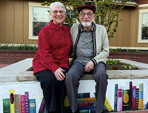 Pepper and Keith Teem in front of the Mt. Angel Public Library. Stephen Floyd