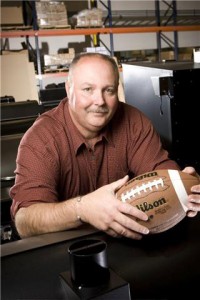 John F. Kennedy High School head football coach Randy Traeger takes a long-range view, teaching life skills on the field.