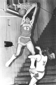 Butte Creek Principal Kevin Palmer dunks the basketball over an opponent back in his high school days.