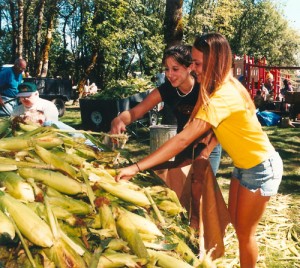 Our Town archive photos by Timm O’Cobhthaigh show the fun, community effort and great results of the Aumsville Corn Festival. Everyone is welcome to head on down to Porter-Boone Park and have an ear – or two!