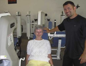 Mike Thompson works with a client at Silverton Fitness