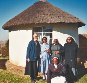 Sr. Dorothy Jean Beyer, left, with sisters in front of the tiny chapel at Cassino, an outstation of the Twasana monastery. The African sisters are Sr. Frances (kneeling), Sr. Hilaria, Mother Theodora, and Sr. Augustin.