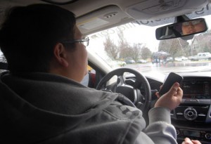 Tanner Kahn learns he can’t text and drive during a test for the Ford Motor Co.’s Driving Skills for Life. 