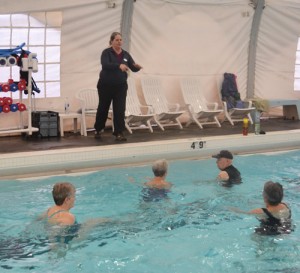 Silver Falls YMCA instructor Cindy Morrison leads a Thursday morning Aquasize class . 
