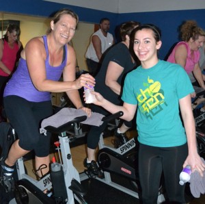 Hannah Kloft, right, volunteered at a race day at Silverton Fitness to raise money and awareness of melanoma.