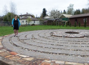 Laura Antonson walking the St. Edward’s labyrinth for the first time. Photo by Melissa Wagoner