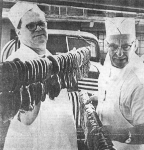 Francis Schmidt & Orville Frank wrangling sausage at the 1968 Oktoberfest.     Submitted by Mount Angel Oktoberfest