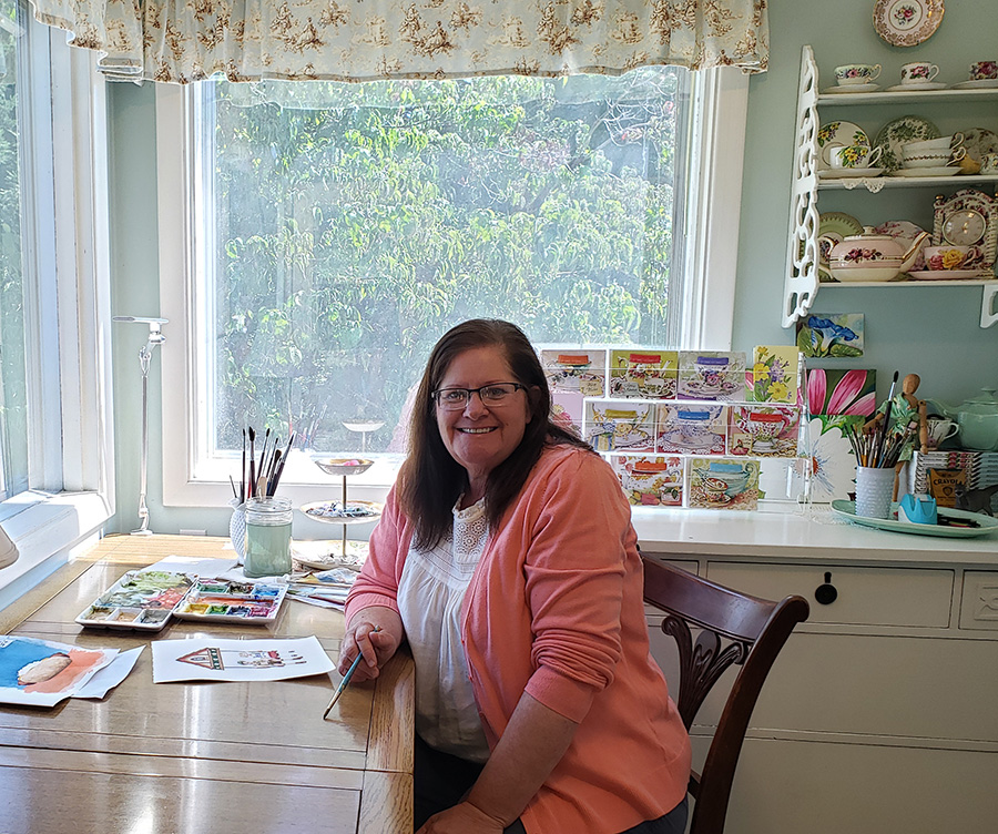 Kimberly Shaw at her Mount Angel studio. Her brisk greeting card business is expanding to watercolor paintings that may be seen at Mount Angel Senior Center.  