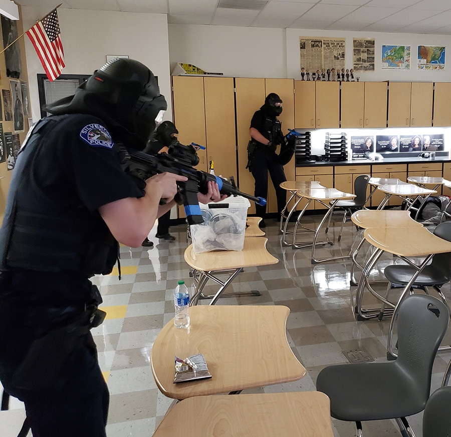 Silverton Police officers work on an active-shooter training  exercise at Silverton High School on Aug. 17. 