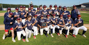 The Kennedy High baseball team, with coach Kevin Moffatt at center holding the trophy, is shown after completing a perfect 31-0 season on June 3 with a 10-0 victory against Blanchet Catholic in the OSAA Class 2A-1A title game at Volcanoes Stadium in Keizer. Submitted Photo