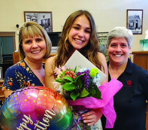 Silverton High’s Avery Lord, center, with Milla Eubank, left, and Lori Sherwood of the Silverton Citizens Bank branch. Lord won a $1,000 scholarship from the bank. Submitted Photo