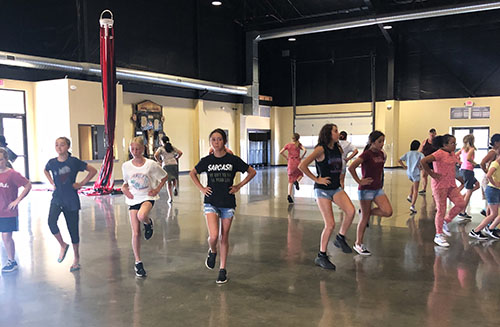 Students rehearsing this summer for the Oktoberfest Dance Troupe. Kelly Grassman