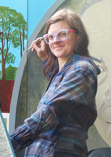 Muralist Kali Dirks working on a new Silverton mural commemorating Dr. Olwyn Davies.  Melissa Wagoner