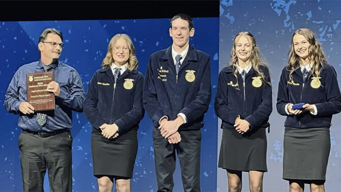 Silverton High FFA adviser Scott Towery, left, and students Jenna Schurter, David Tribbett, Joanne Noordam and Rebecca Noordam are shown at a national competition in Indianapolis. The students took fourth in ag sales team and Rebecca Noordam placed 10th as an individual. Submitted Photo