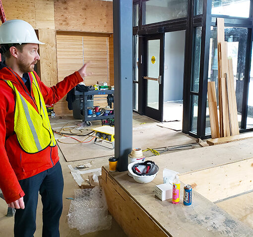 Silverton Community Development Director Jason Gottgetreu points out the features of a ground-floor entry area of the new Silverton Civic Center. The building is tentatively set to open in late April. James Day