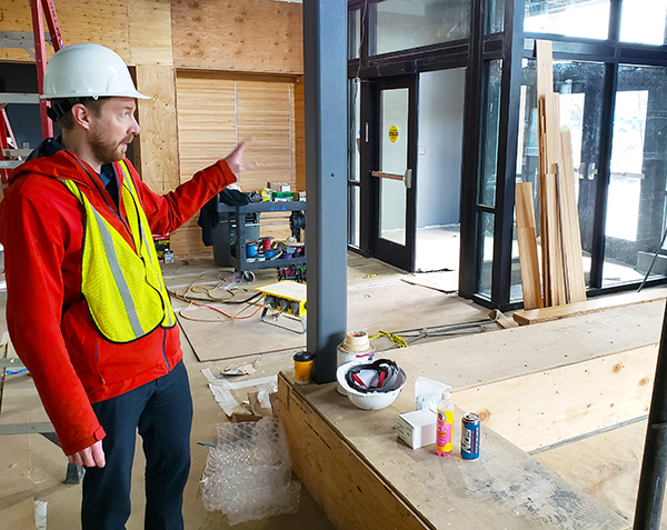 Silverton Community Development Director Jason Gottgetreu points out the features of a ground-floor entry area of the new Silverton Civic Center. The building is tentatively set to open in late April. James Day