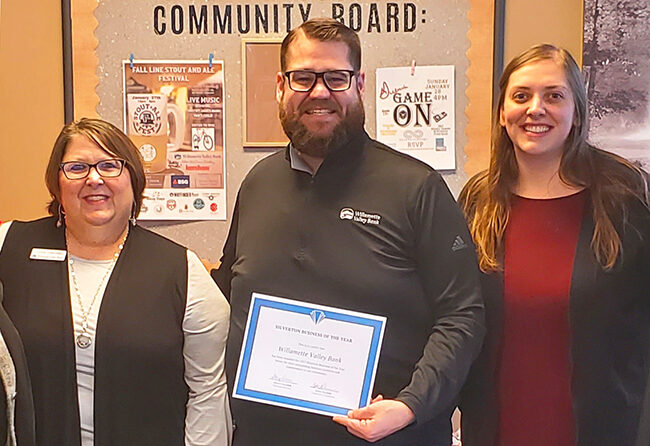 Silverton Willamette Valley Bank operations manager Johna Overfield, branch manager Joshua Keck, and staff member Rachel Sepull. Submitted Photo