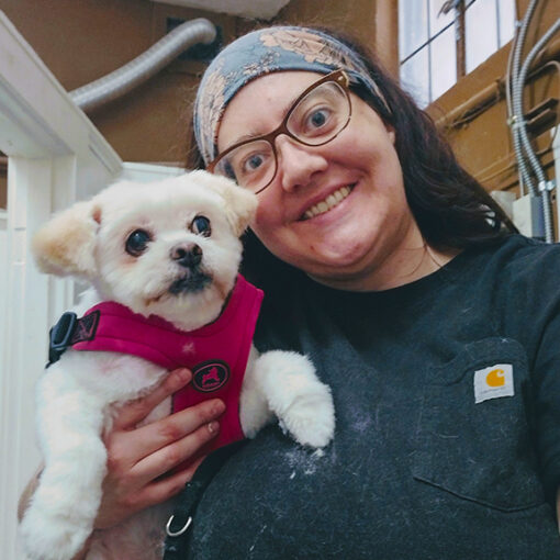 Cassy Proffitt, owner of PNW Pooch in Mount Angel, posing with a customer. Submitted Photo