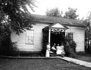 In 1909, the family was photographed in front of Percy Brown’s home – from left, Percy’s wife, Ethel, son, Delmar, Percy, his mother, Mrs. James Brown (Edna), baby Florence, and child in wagon, Percy’s son, Lowell.     